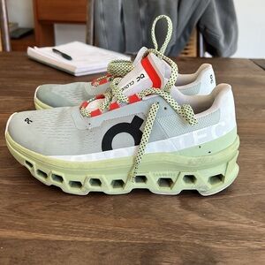 On Women’s Cloudmonster running shoes. Size 8.